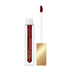 Liquid sindoor applicator with maroon doe-foot tip and maroon swatch, clear vial