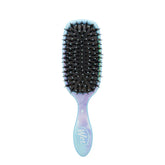 Hair treatment brush with oval pad and black bristles, light blue handle