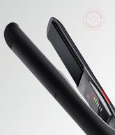 Black hair straightener with vented barrel and digital display panel