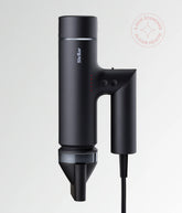 Black Stellar OmniFlex hair dryer with concentrator nozzle and power cord