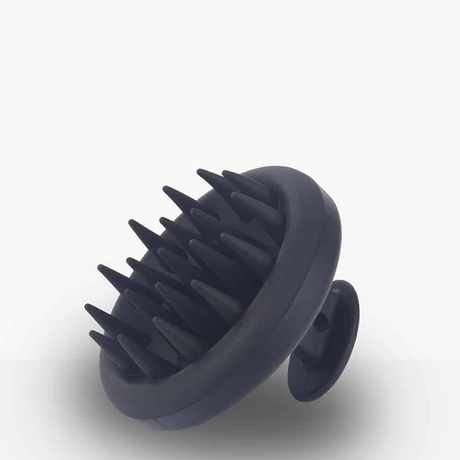 MUVO scalp brush with curved handle and flexible bristles, dark