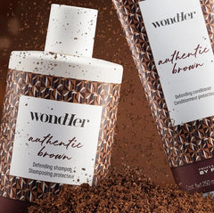 Wondher authentic brown defending shampoo bottles with brown geometric pattern