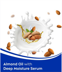 NIVEA body milk bottle in milk splash with almond oil droplets