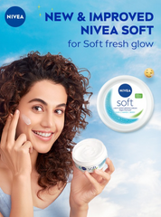 Moisturizer jar held in hand, NIVEA Soft light cream with white swirl