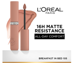 Nude rose liquid lipstick bottle and black applicator wand held in hand
