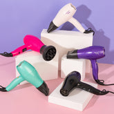 Baby travel hair dryer set in pink, purple, mint, and black with diffuser and nozzle
