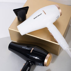 Black and white hair dryers with concentrator nozzles and gold-tone details