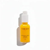 Ultimate repair serum bottle with pump; amber liquid in 30 ml glass, white cap