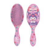 Pink paddle hair brush with Kuromi character graphic and black bristle pins