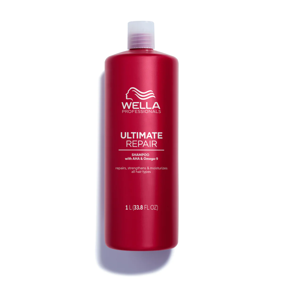 Wella Professionals Ultimate Repair shampoo bottle, 1 L, dark red with pump cap