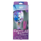 WetBrush detangle and style kit packaging with brush and pink hair accessory