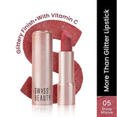 Glitter lipstick in mauve with rose-gold tube and exposed bullet applicator.