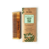 Oil-treated wooden pocket comb with fine teeth, shown next to boxed packaging.