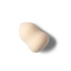 Makeup sponge blender, light beige teardrop shape with curved side