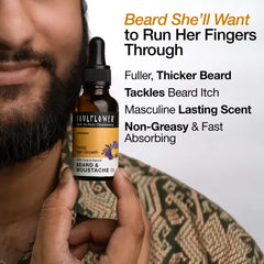 SoulFlower Beard & Moustache Oil bottle with black dropper held near man's beard.