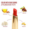 Long-stay matte lipstick with gold tube and red top over ingredient icons