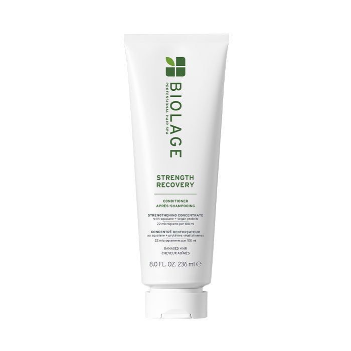 Biolage Strength Recovery conditioner in white squeeze tube with green logo and label