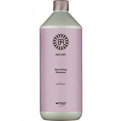 Nourishing shampoo bottle with lavender label and flip-top cap