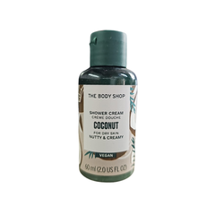 The Body Shop coconut shower cream bottle, 60 ml, green cap and label for dry skin