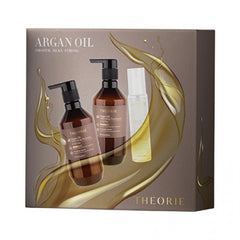 Theorie Argan oil gift set box with bottles and gold leaf design