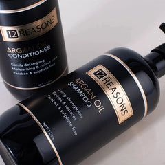 Argan oil shampoo and conditioner bottles with pumps, black with gold 12 REASONS labels