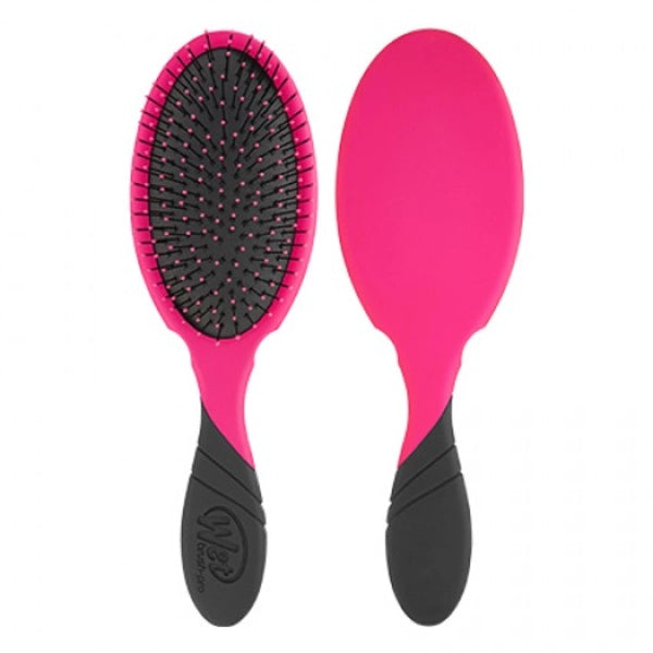 Pink detangling hair brush with oval pad and flexible bristles