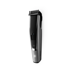 Beard trimmer with comb guard and side profile, power switch visible