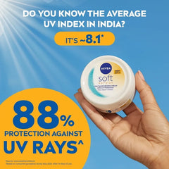 NIVEA Soft daily UV light moisturising cream SPF 15 jar held in hand