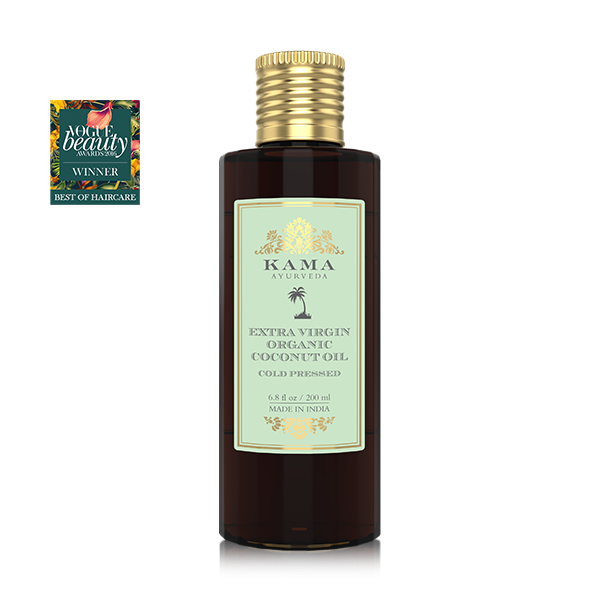 Kama Ayurveda extra virgin organic coconut oil bottle, dark amber with gold cap