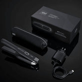 Cordless hair straightener and charging cable with black storage box