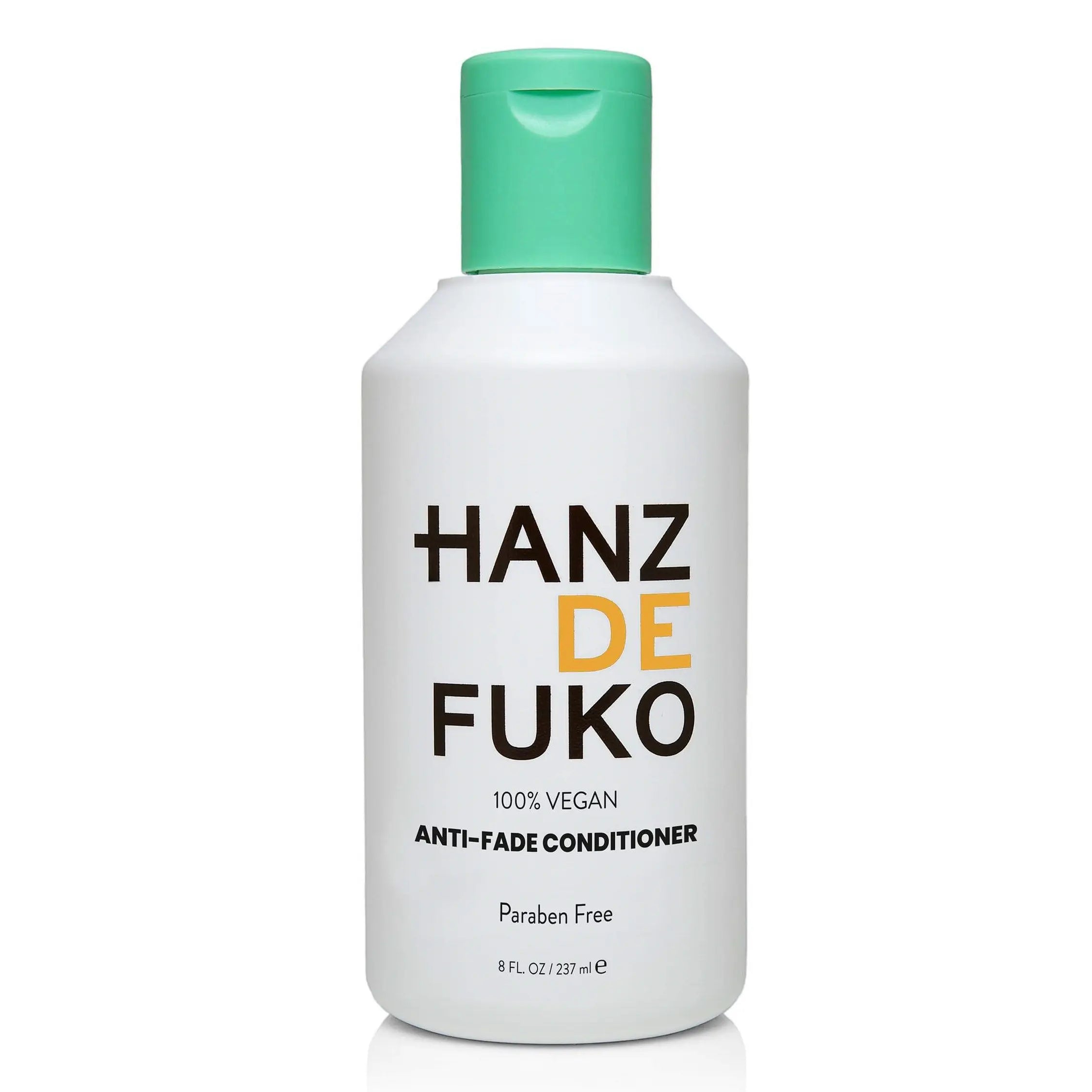 Anti-fade conditioner bottle with green cap, white label text