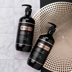 Marula oil shampoo and conditioner pump bottles