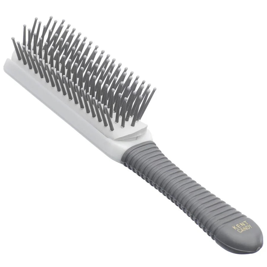 White and gray hairbrush with flexible bristles and KENT logo on handle
