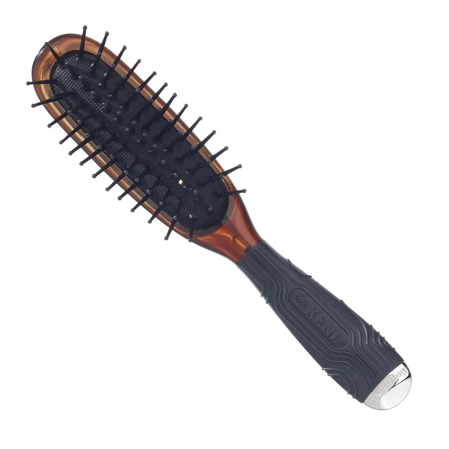 Tortoiseshell-effect mini hairbrush with dark boar bristles and rounded cushion base