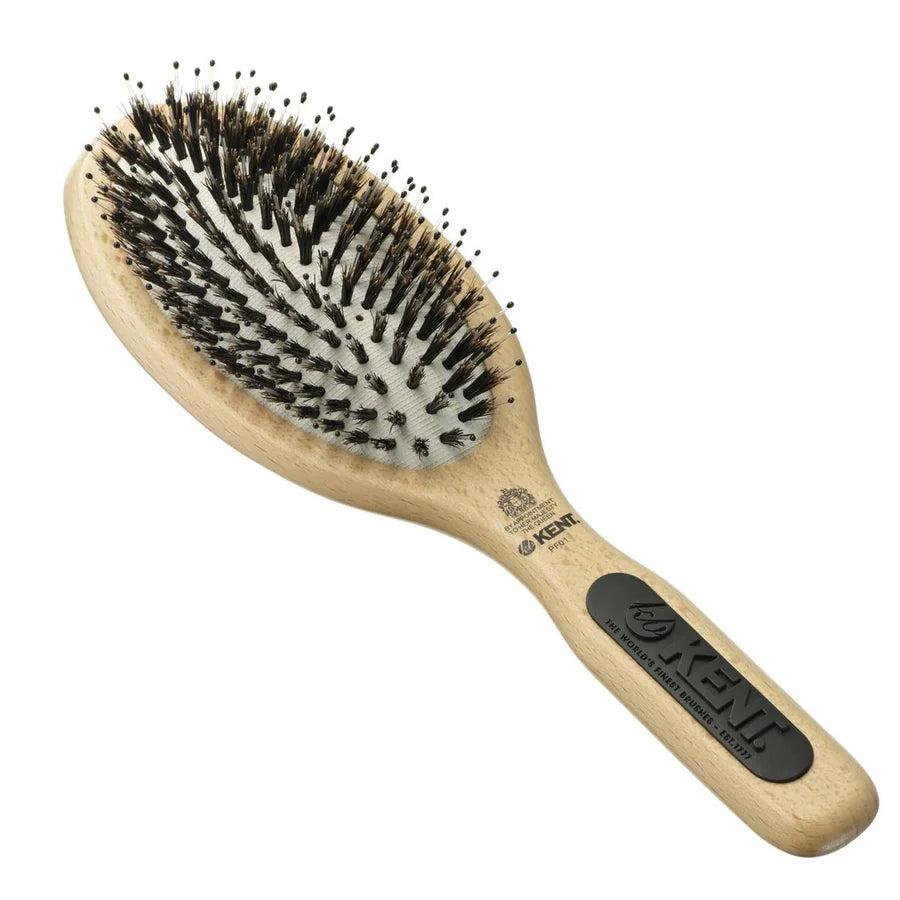 Wooden oval hair brush with dark bristle pins and KENT logo handle