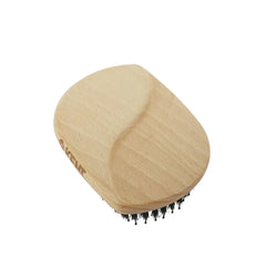 Oval wooden hair brush with dense black bristles