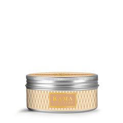 Kama Ayurveda body butter jar with ribbed silver lid and gold diamond pattern label