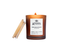 Brown soy candle with Angel label and lit flame
