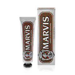 Marvis toothpaste tube and box with rhubarb-themed red and green label
