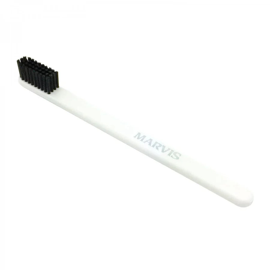 Marvis toothbrush with soft white handle and black bristles