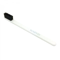 Marvis toothbrush with soft white handle and black bristles
