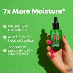 Matrix Food For Soft hair oil serum in a hand, green bottle with black cap