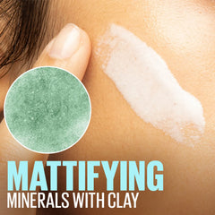 Matte primer swatch on skin with green minerals circle and white cream smear
