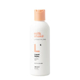 Shaping liquid hair styler bottle, 200 ml, white with orange cap and Milk_shake label.