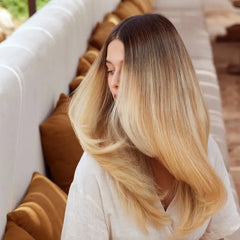 Keratin system smoothing shampoo, with glossy blonde hair lengths