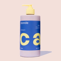 Blonde shampoo bottle with yellow pump, blue and pale purple label