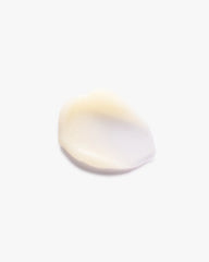 Hair conditioner cream dollop, off-white, smooth texture.