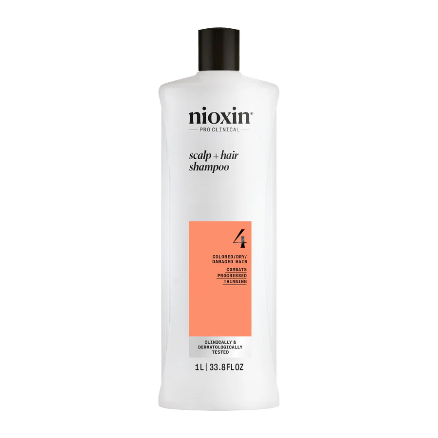 Nioxin System 4 scalp + hair thickening shampoo bottle, 1 L, white with orange label
