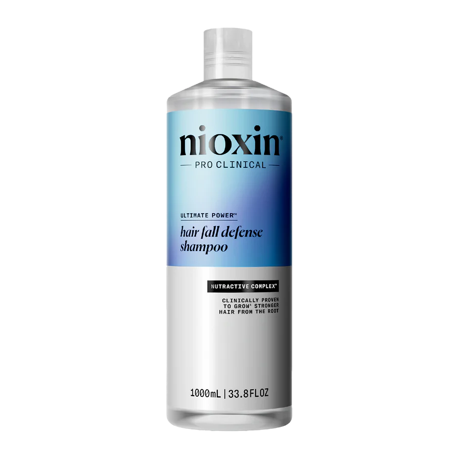 Nioxin hair fall defense shampoo bottle, 1 L, blue label with white cap