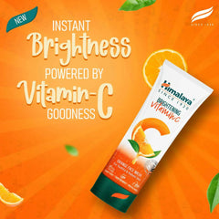 Himalaya Brightening Vitamin C orange face wash tube, angled view with green base